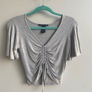 Gray ruffled sleeve with tie front blouse